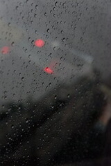 detail of raindrops on car window