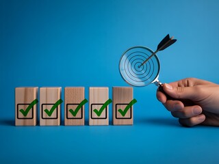 Wooden blocks with green checkmarks and a magnifying glass with an arrow hitting the bullseye checklist