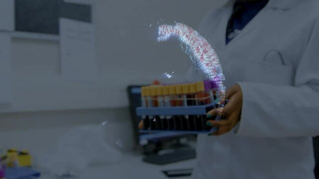 Technician entering frame holding rack activating rotating globe and aligning samples for mapping
