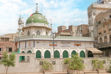 In Lahore, Pakistan, Masjid Wazir Khan boasts beautiful Mughal architecture, including ornate tile work, frescoes, and impressive minarets, making it a significant cultural and historical landmark.