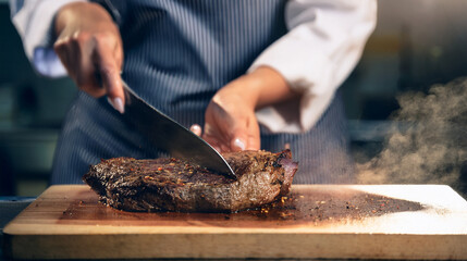 Dynamic Shot: Steak Being Sliced with Visible Steam Rising
