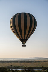 Hot air balloon safari over Mara River in Serengeti National Park, Tanzania during Great Migration