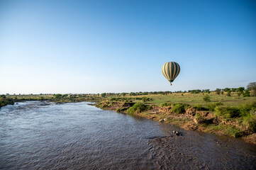 Hot air balloon safari over Mara River in Serengeti National Park, Tanzania during Great Migration