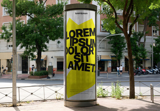 Blank advertising pillar mockup for OOH campaign, showcasing advertisement design template in urban street of Madrid, Spain