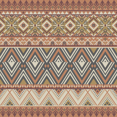 Bold tribal chevron design in earthy colors. Evokes tradition and craftsmanship with native motif styling.