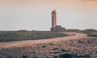 Lighthouse on the shore of the sea