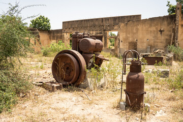 Rusted remains of a pump behind an old Italian mineral water factory in rural Eritrea