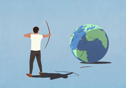 Man with bow shooting arrows at large globe against blue background
