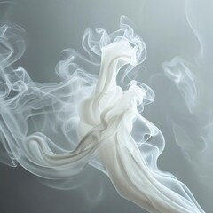 Fototapeta premium Ethereal white smoke swirling gracefully against a soft gray background, forming delicate, flowing patterns.