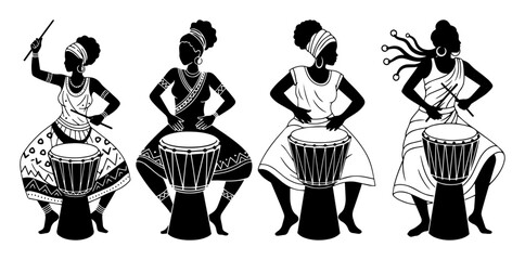 four african women playing djembe drums © Camel