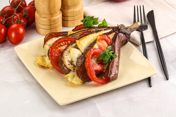 Baked tomato with mozzarella and tomato