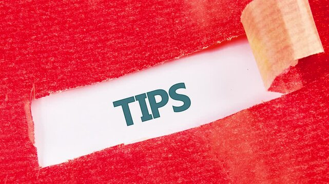 The appearance of the word TIPS under torn paper on a white background. Tips word concept .