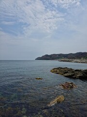 Blue sky and blue sea meet horizon, beautiful clouds, clear and clean seascape, beautiful coastal natural landscape background, Yeongdeok, South Korea - 푸른 하늘과 푸른 바다가 맞닿은 수평선, 멋진 구름, 맑고 깨끗한 바다, 자연 풍경