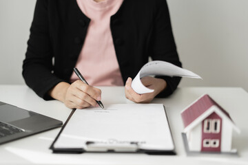 cagents working in real estate investment and home insurance signing contracts in accordance with...