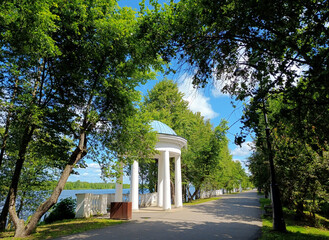 Volga river embankment with a rotunda on a sunny day in Dubna, Moscow Region, Russia