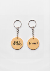 Keychain set with "Best Friend" and "friend" tags for friendship concept  
