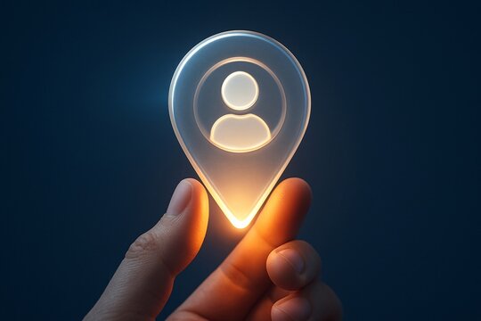 Hand holding glowing location pin with person icon symbolizing user or destination