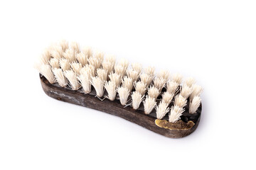 old scrub floor brush made from wood that has been heavily used is worn out and are stains with...