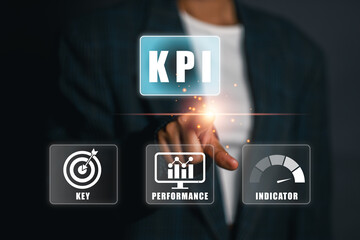Businessman interacting with KPI interface, highlighting key performance indicators for business...