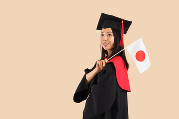 Female Asian graduate with flag of Japan on beige background