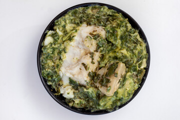 Traditional South African side dish of spinach and pap or maize meal