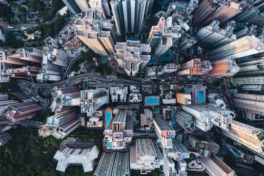 Aerial top down view of road through high rise buildings, Hong Kong