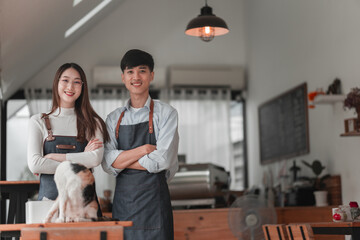 Smiling business partners with cat in cozy office, casual environment, friendly atmosphere