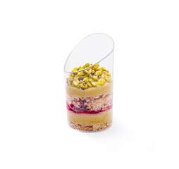 Delicious layered dessert with pistachios showcased on a clean surface