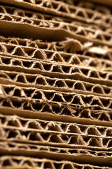 old Multilayer cardboard for boxes and other items, stacked large amounts of corrugated cardboard...