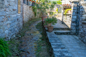 Ancient stone arches, weathered walls, medieval charm, Italian old town atmosphere, timeless travel...