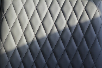 background .Genuine leather texture with embossed pattern showcasing intricate details and rich color, perfect for design and artistic applications. Copy space