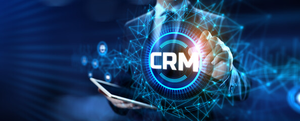 CRM Customer relationship management concept. Businessman pressing button on screen.