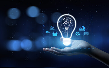 Innovation Driving Business Growth and Technological Advancement with Human Hand Holding Lamp Hologram.
