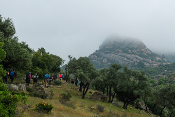 People trekking in Latmos mountains in spring. Latmos Caria trekking route. Latmos trekking route among historical ruins. Hiking from Latmos Mountain to Lake Bafa. Walking by Lake Bafa.