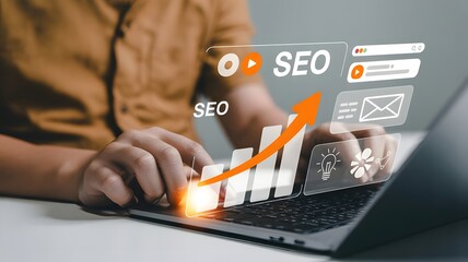 A person works on their laptop, focusing on improving their websites seo and increasing online visibility