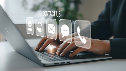 Person using a laptop to contact customer support, with various communication icons displayed on the screen