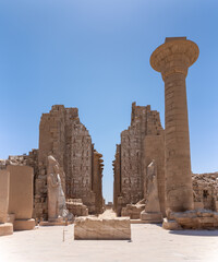 Karnak temple complex showing walls, columns, and statues in luxor, egypt