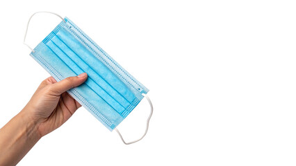 Hand Holding Blue Disposable Protective Mask Against on transparent background