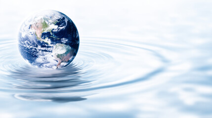 Floating Earth in water creates a surreal and serene atmosphere with calming blues and greens