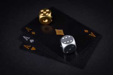 Playing cards and dices. Gambling concept. Dark background