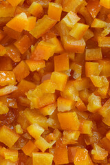 Close-up view of candied orange peel background texture.  Flat lay.