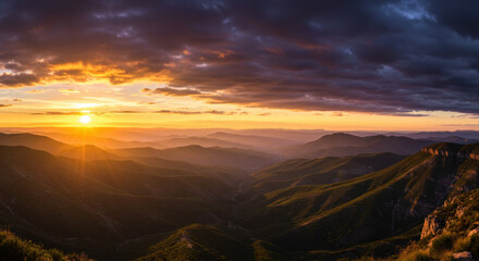 Golden sunset over mountain valley panorama