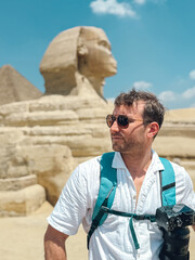 Photographer visiting the great sphinx of giza, egypt