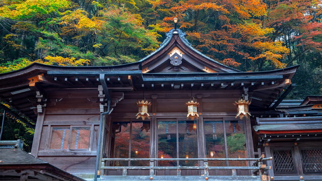 Kifune Shrine in Kyoto, Japan with beautiful autumn scenery. The shrine is dedicated to the god of water and rain and believed to be the protector of those at sea