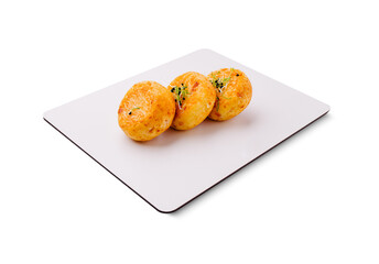 Savory cheese balls served on a minimalist plate for a delightful snack