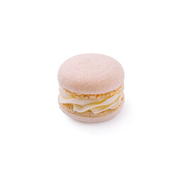 Delicious pink macaroon with creamy filling on a white background