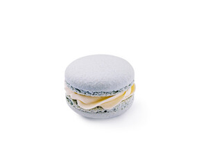 Delicate gray macaron with creamy filling on a plain background