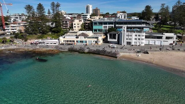 Cronulla waterfront neighborhood with calm turquoise sea and low-rise buildings, Sydney NSW Australia