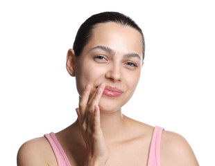 Young woman with lip balm on white background