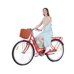 Smiling woman riding bicycle with basket on white background